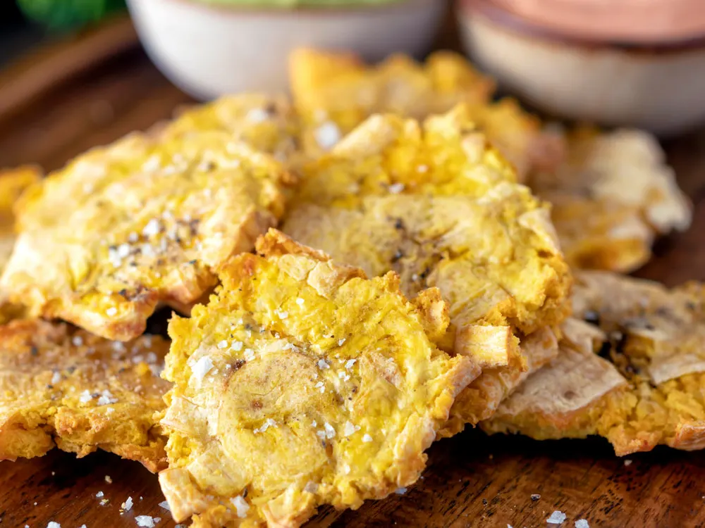 WHAT ARE THE DIFFERENCE BETWEEN TOSTONES AND PATACONES?